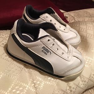 Puma leather white and blue tennis shoes